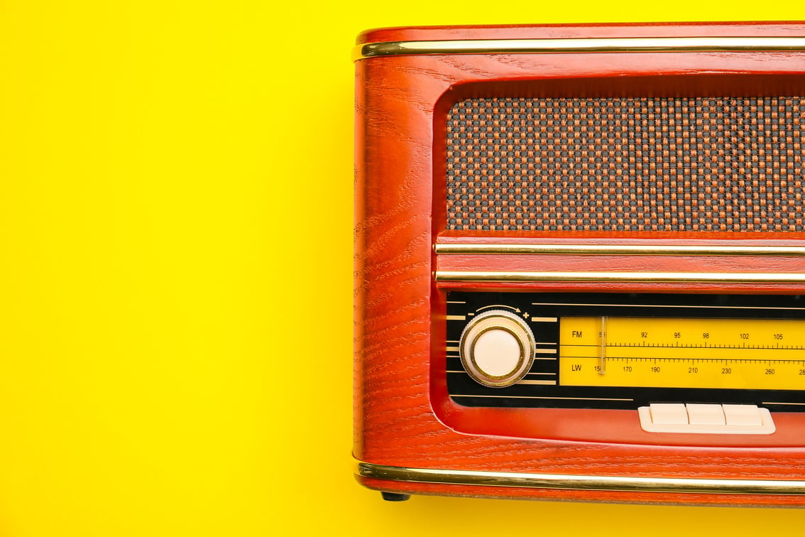 Vintage Radio Receiver on Color Background